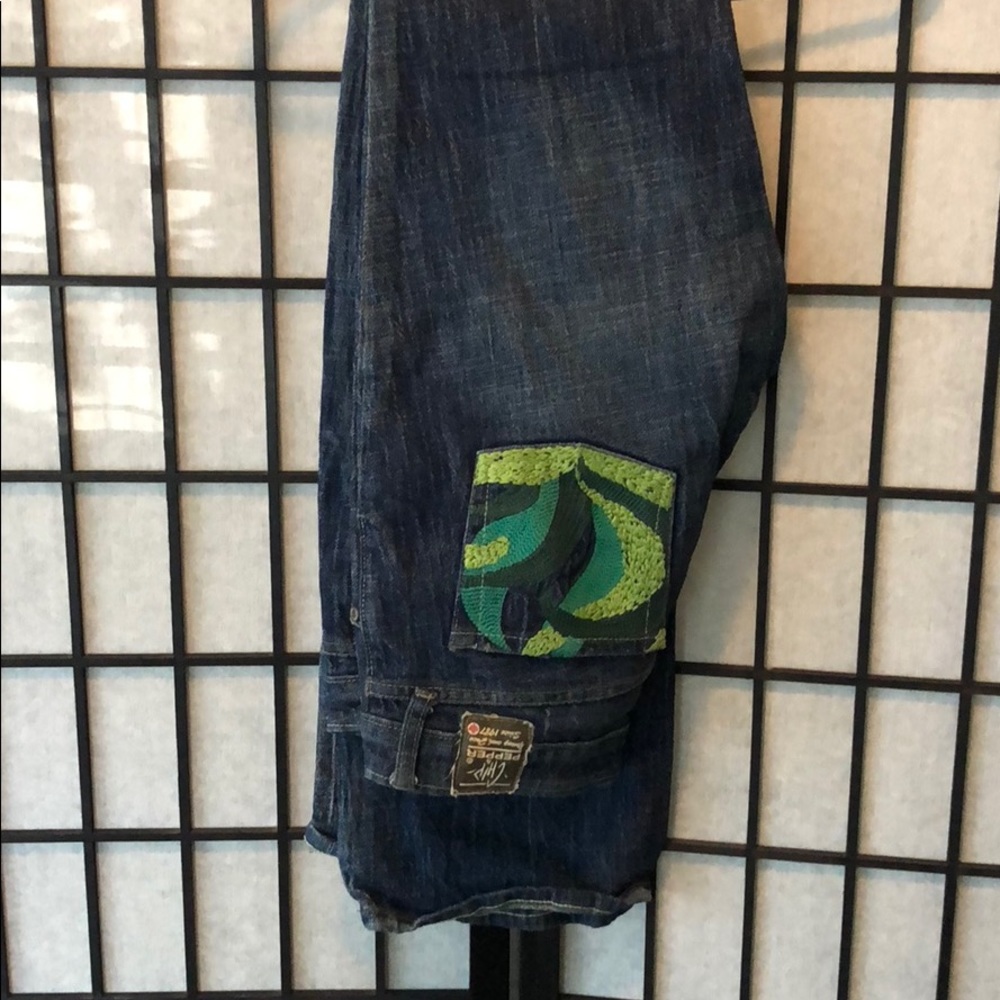 Jeans with design on right back pocket